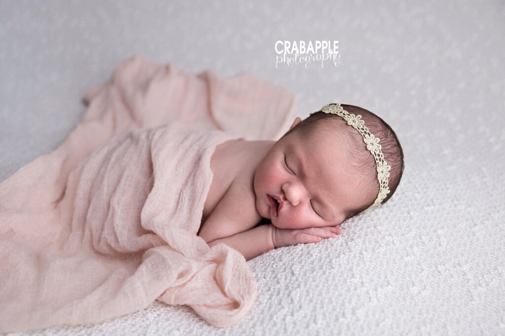 newborn photo ideas baby girl in soft pink wrap light airy newborn photography North Andover MA
 