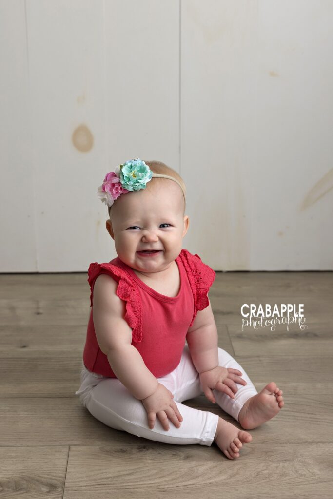 joyful sitter session baby portrait Bedford MA smiling 8 month old baby girl sitter portrait photography Bedford MA
