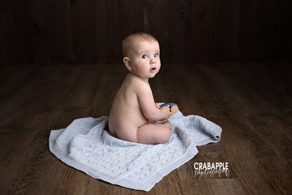 Neutral setup baby sitting in neutral toned studio setup Andover MA