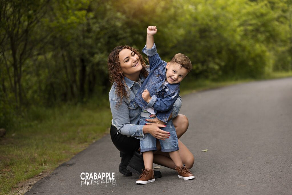 Fun candid mommy and me photo with 3 year old toddler boy outside in North Shore MA