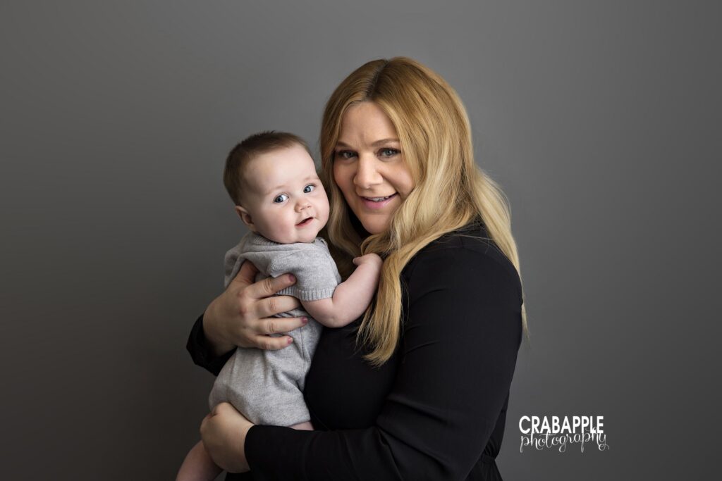 Mommy and me photo of baby boy and his mother during sitter session photoshoot in Andover MA