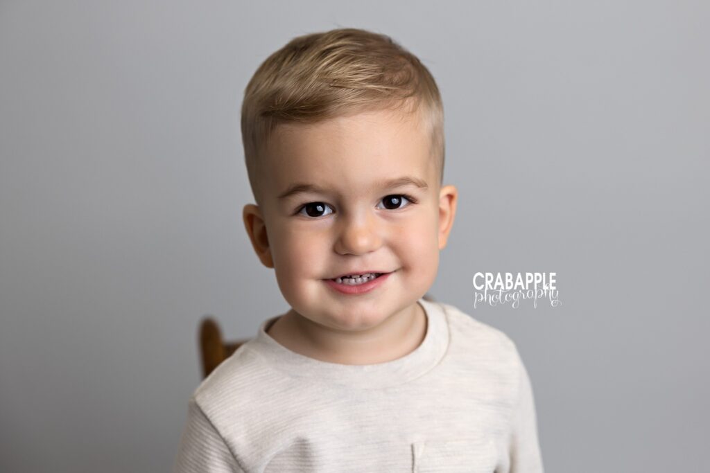 close up toddler smiling studio portrait
