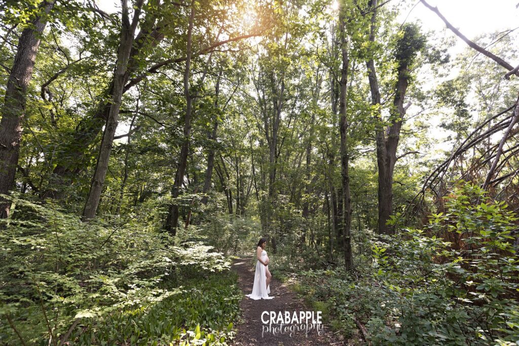 pregnant mother standing outdoors during maternity session near Boston MA