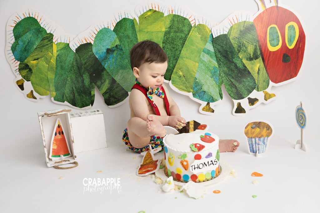 Colorful first birthday cake smash session in Andover MA photography studio
