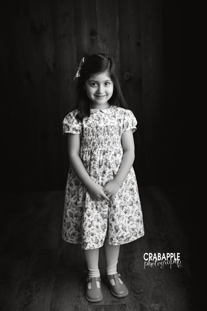 Big Sister Portrait Black and white portrait of older sister during newborn session