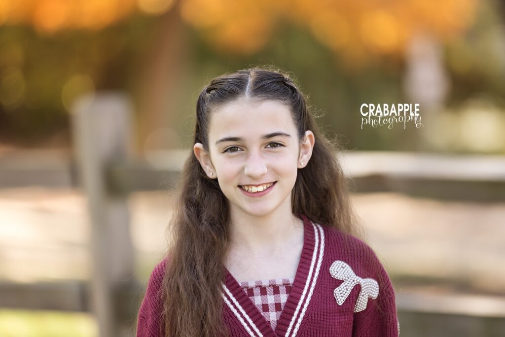 Medford MA fall child portrait Child enjoying an outdoor fall portrait session in Medford MA