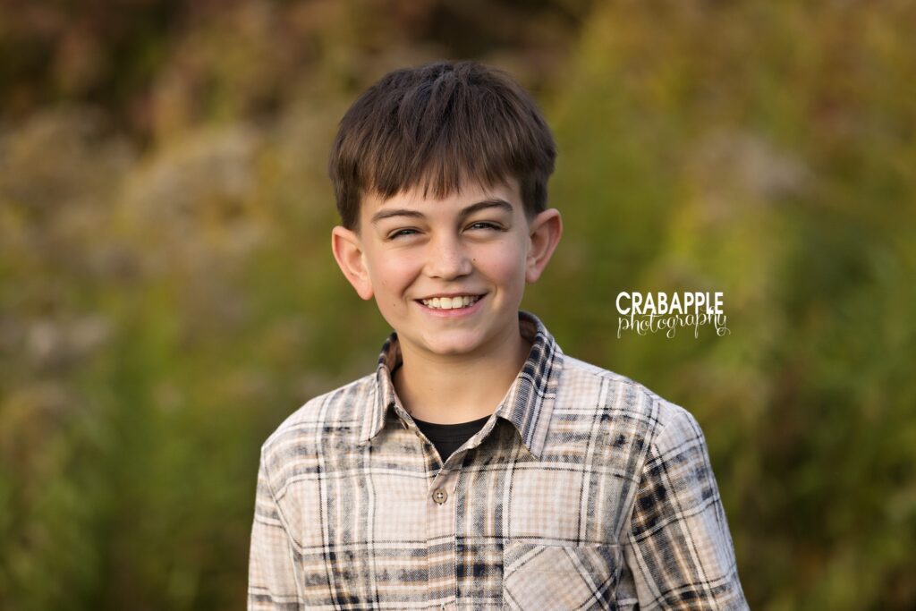 Fall child portrait in North Reading Child enjoying an outdoor fall portrait session at Ipswich River Park in North Reading