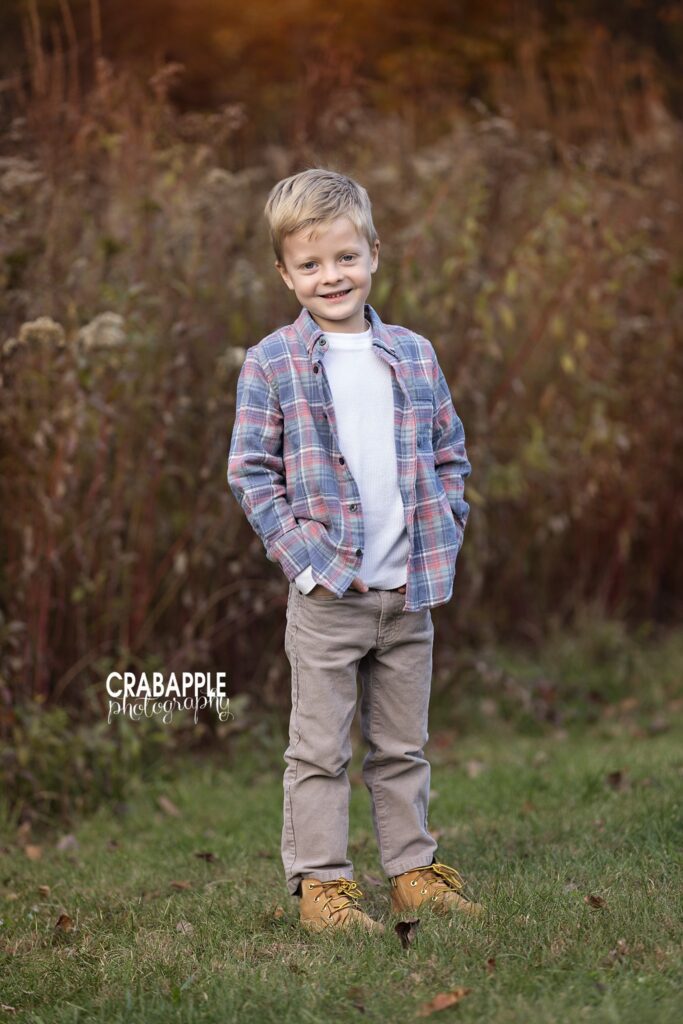 Fall child portrait at Ipswich River Park Child posing for fall family photos at Ipswich River Park in North Reading MA