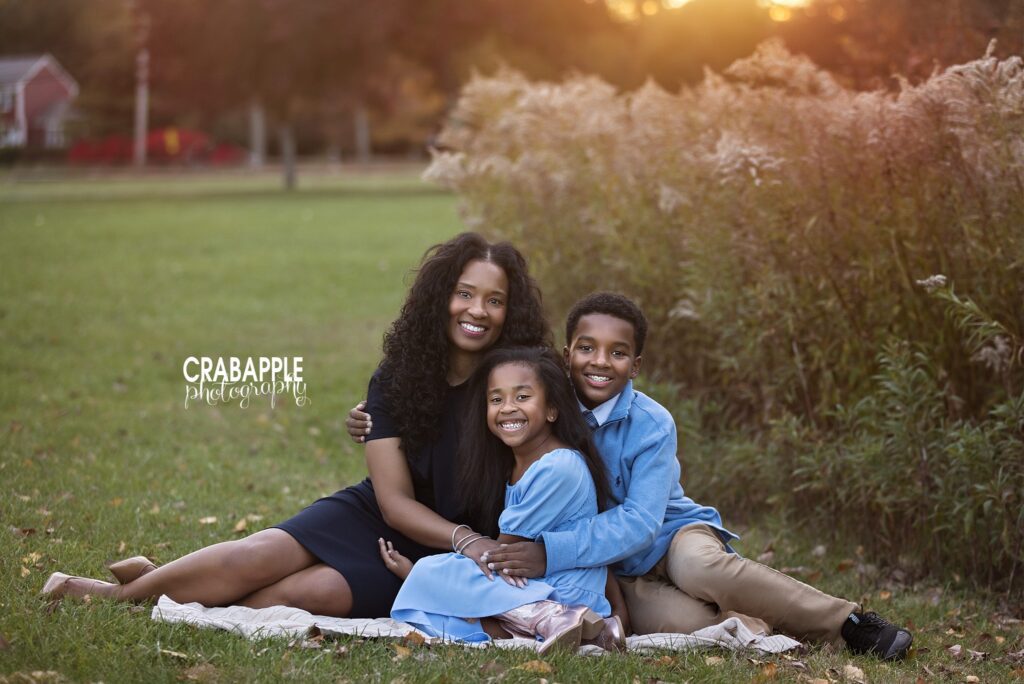 North Reading fall family photos Mother and children smiling together during fall family photos in North Reading MA