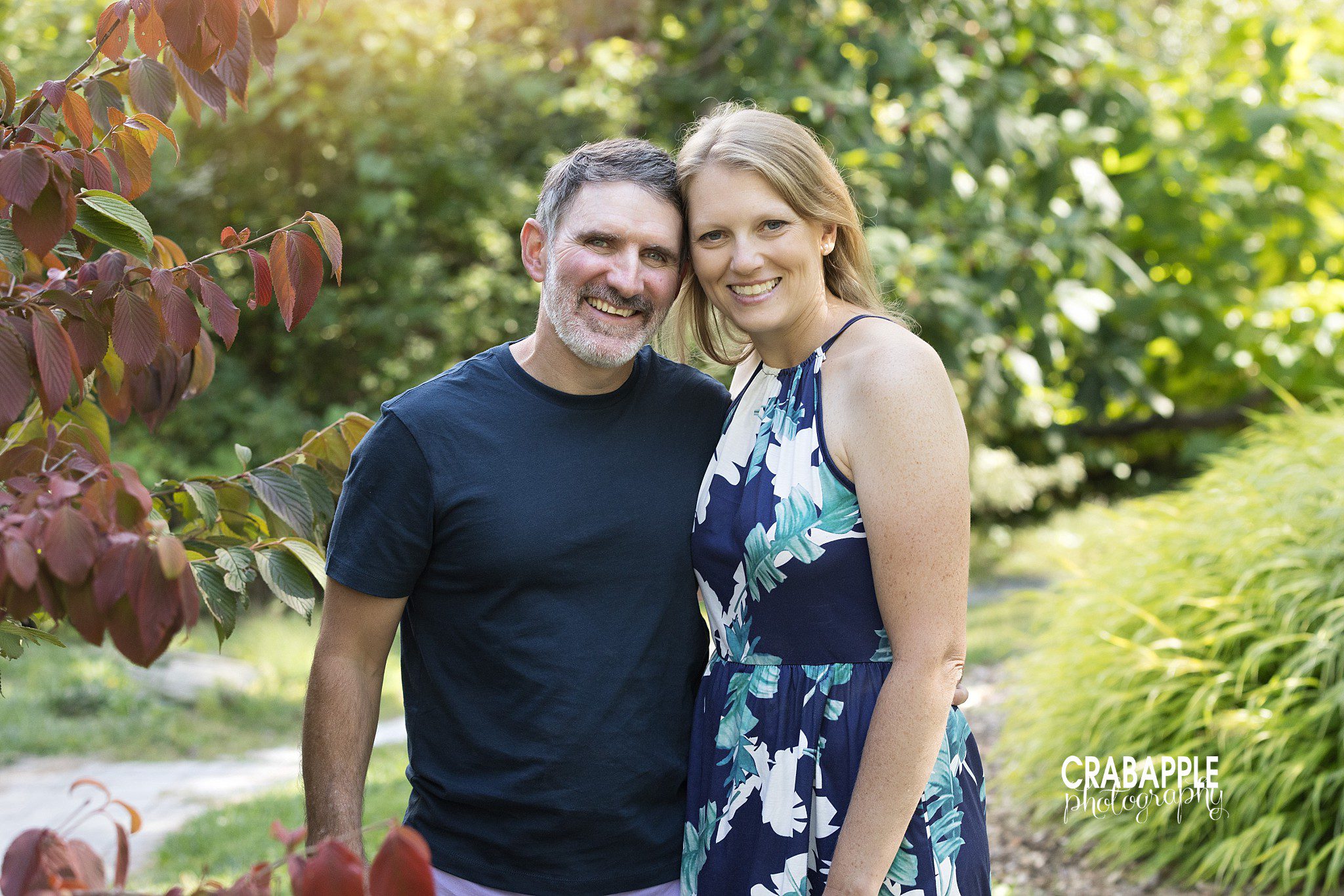 Parents together during their outdoor family session at the Acton Arboretum
