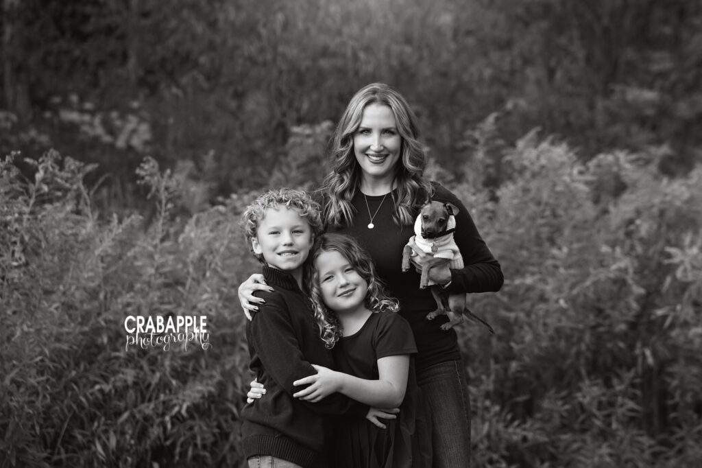 North Shore fall family photos Family posing together for North Shore fall family photos at Ipswich River Park