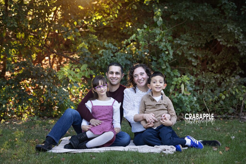 North Shore fall family photos Family together during an outdoor fall portrait session near Boston and the North Shore