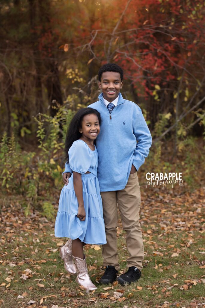 Sibling fall photos at Ipswich River Park Siblings together during a fall family photo session at Ipswich River Park in North Reading