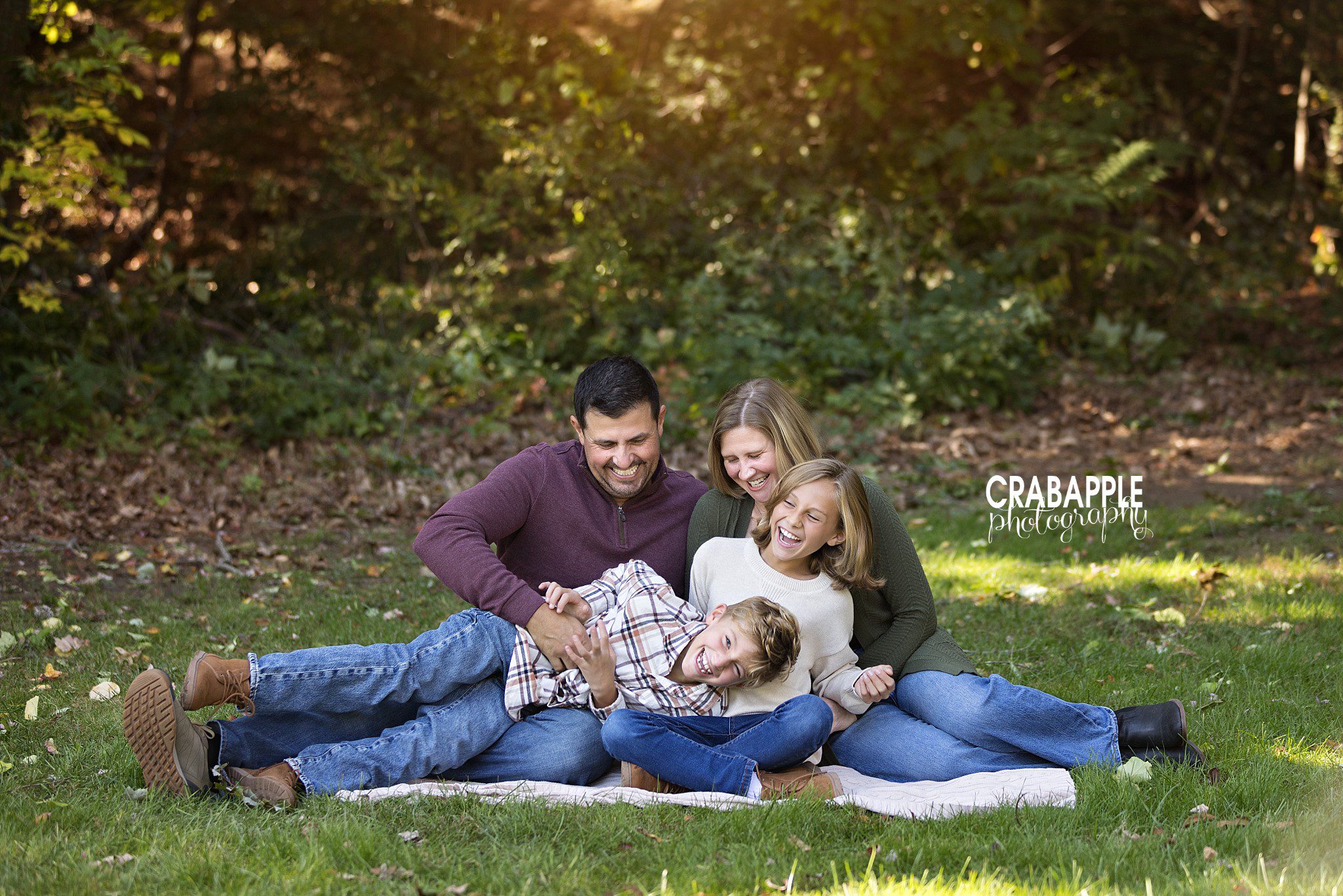 Fun and candid photo of a family during Medford MA fall photos