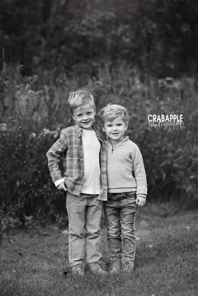 Black and white sibling portrait Two brothers standing together for a black and white fall portrait in North Reading